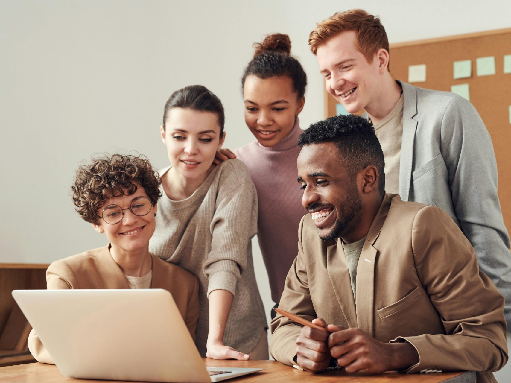 Photo Of People Looking On Laptop